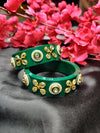 Bold and Beautiful: Green Plastic Bangles with Eye-Catching Round Stones