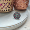 Jewel Box Jolt: A Red and Green Studded Ring