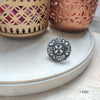 Floral Fusion: A White Pearl Ring with Oxidized Charm