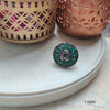 Emerald Dreams: A Green Stone Ring with a Touch of Whimsy