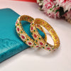 Elegant Pearl-Studded Golden Bangles