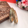 Vibrant Kundan Bangles with a Golden Touch