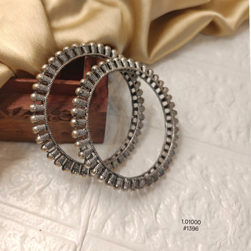 Yellow Chimes Oxidised Silver-Plated Bangles