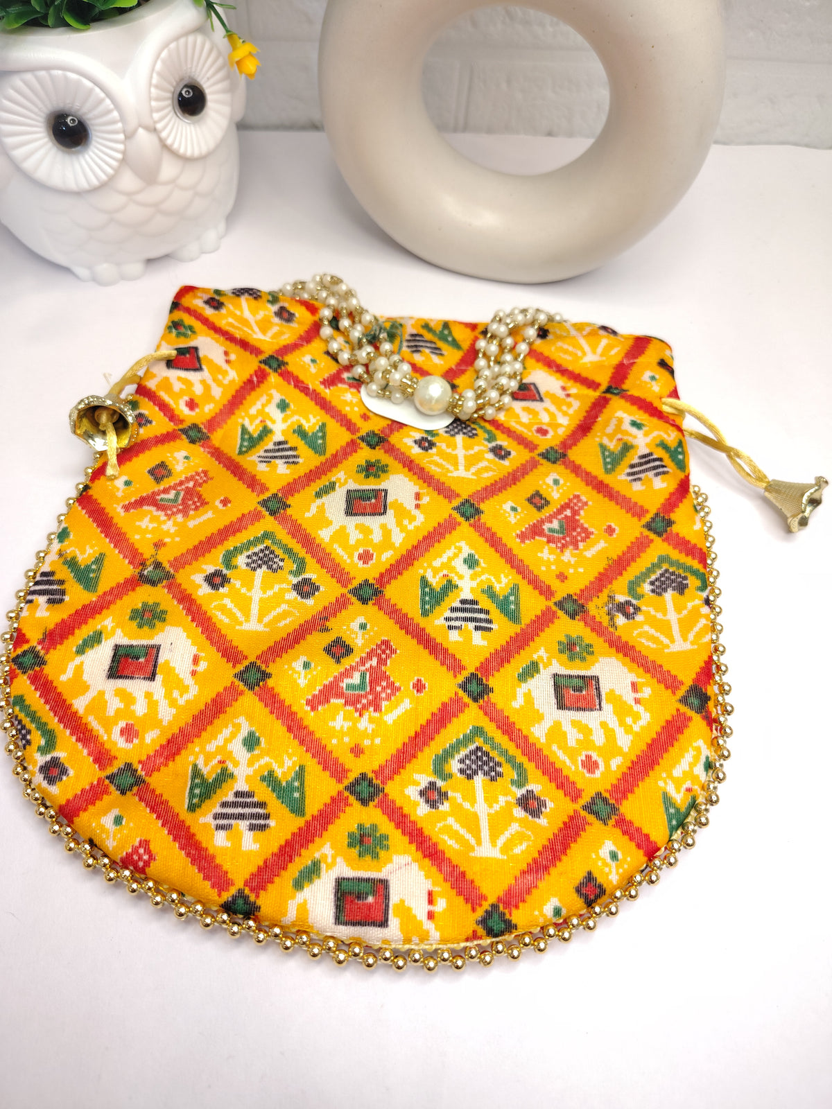 Traditional Patola Yellow Potli