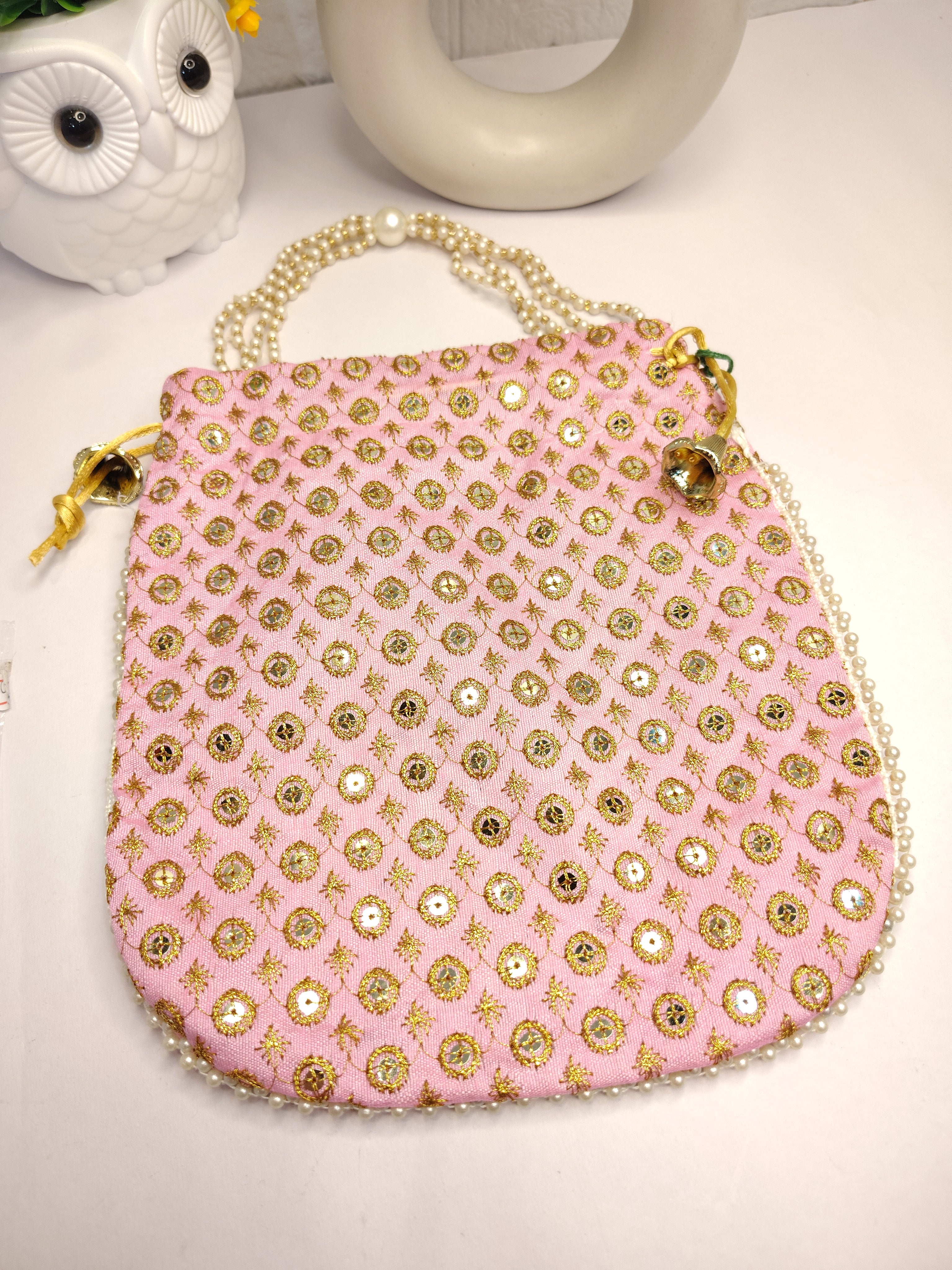 Stylish Pink Potli Bag with Intricate Embroidery