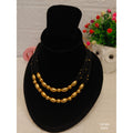 Golden Shadow Necklace – Chic Gold Balls with Black Accents