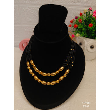 Golden Shadow Necklace – Chic Gold Balls with Black Accents