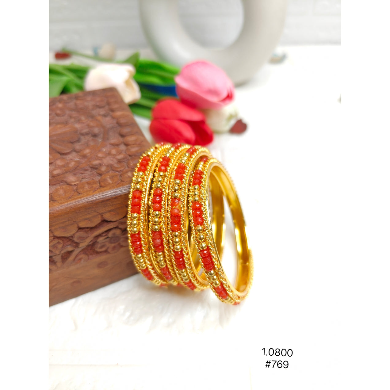 Elegant Gold-Plated Bangles with Red Beads