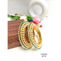Elegant Gold-Plated Kundan Bangles with White Stones and Green Highlights