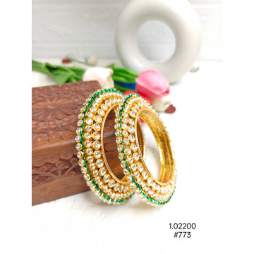 Elegant Gold-Plated Kundan Bangles with White Stones and Green Highlights