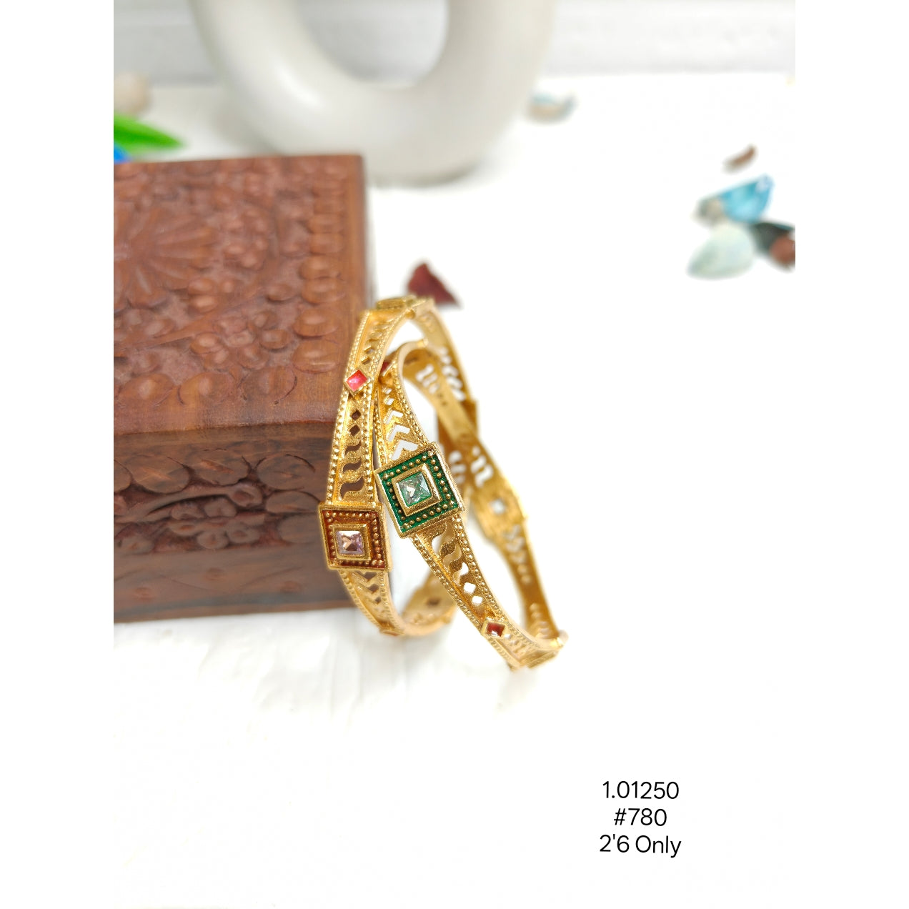 Ethnic Gold-Plated Bangles with Intricate Cutwork & Red Green Stones