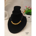 Black beads and gold-plated textured balls Necklace